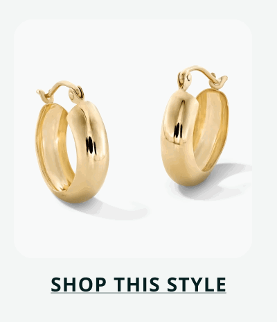 A pair of chunky, polished gold mid-size hoop earrings. Click here to shop this style