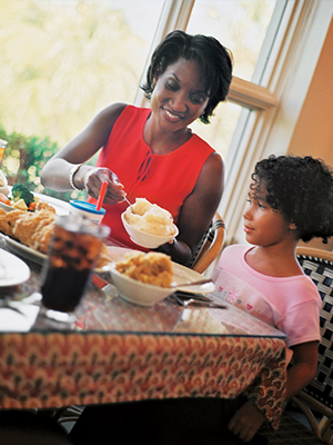 A mother and her daughter enjoying a meal at Busch Gardens
