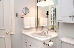 An interior designer's list of the mistakes that make tiny bathrooms feel even smaller