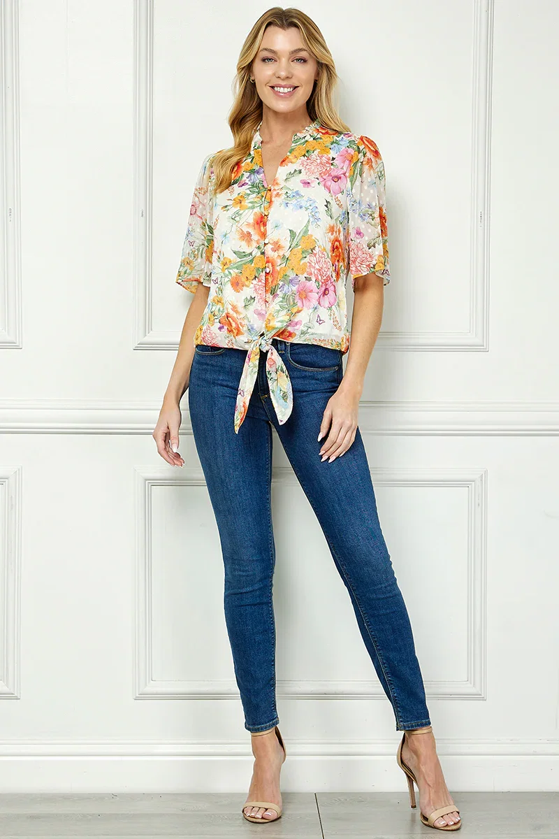 Image of Short Sleeve V-Ruffle Neck Tie Front Blouse in Ivory/Coral/Pink