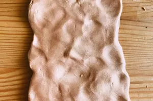 Role out a piece of clay to copy this easy and beautiful garden accent
