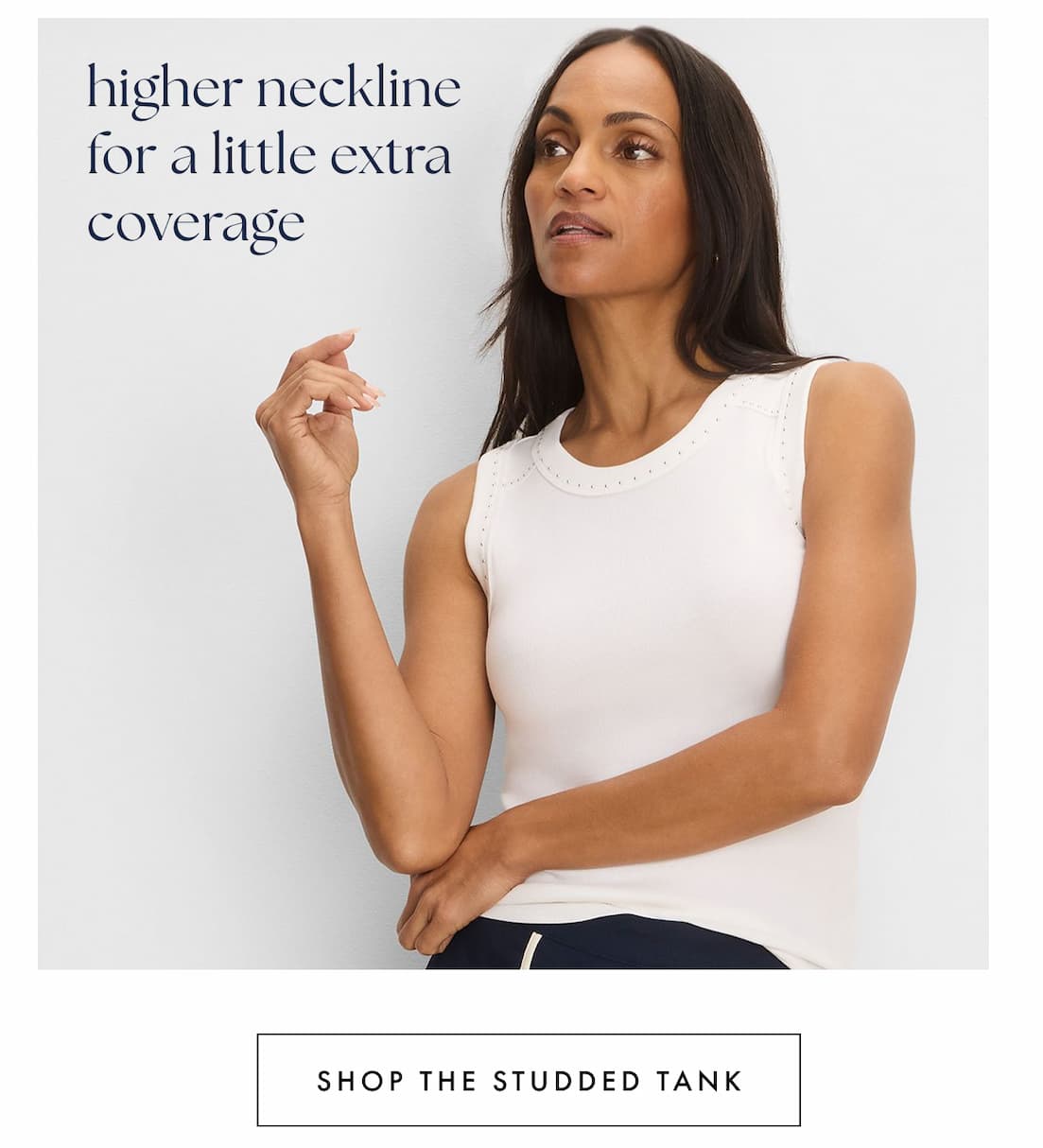 Higher neckline for a little extra coverage. The lady wearing the Perfect Rib Knit Studded Tank in Paper White.