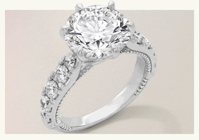 Thick silver-set diamond eternity band with circle-cut diamond placed on center with 6 prongs.