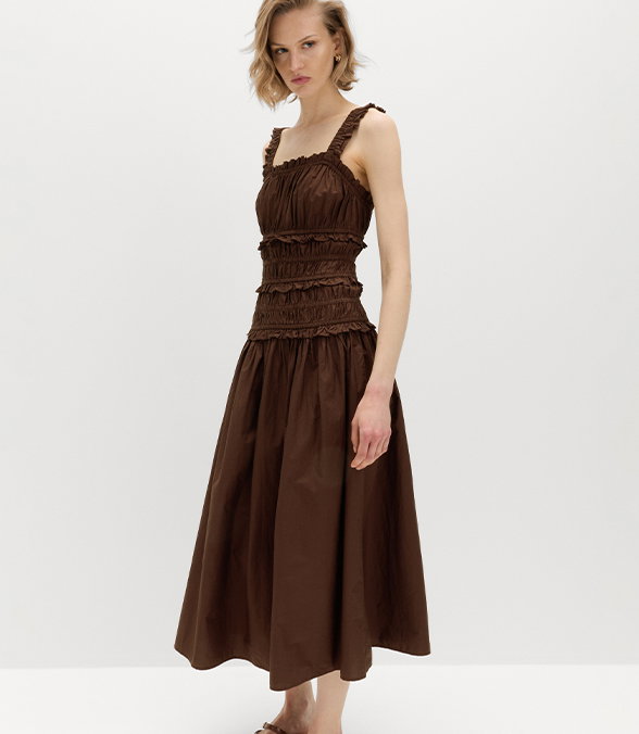 Woman wearing Pure Cotton Shirred Midi Waisted Dress in Chocolate