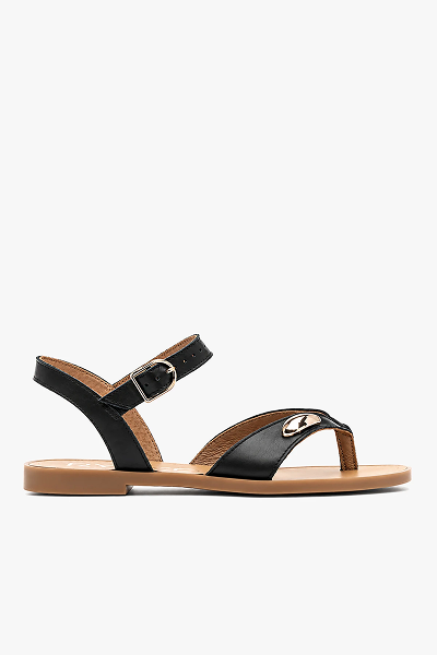 Black leather sandal with buckle strap and gold accent on white background