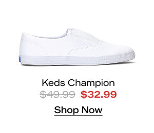 A side view of the Keds Champion Twill Round Toe Slip-On in white which was $49.99 and is now $32.99 for a limited time. Shop Now.
