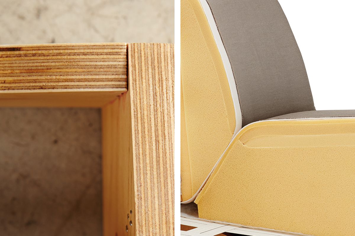 Close-up of layered wood joinery and foam cushion construction used in upholstered furniture.