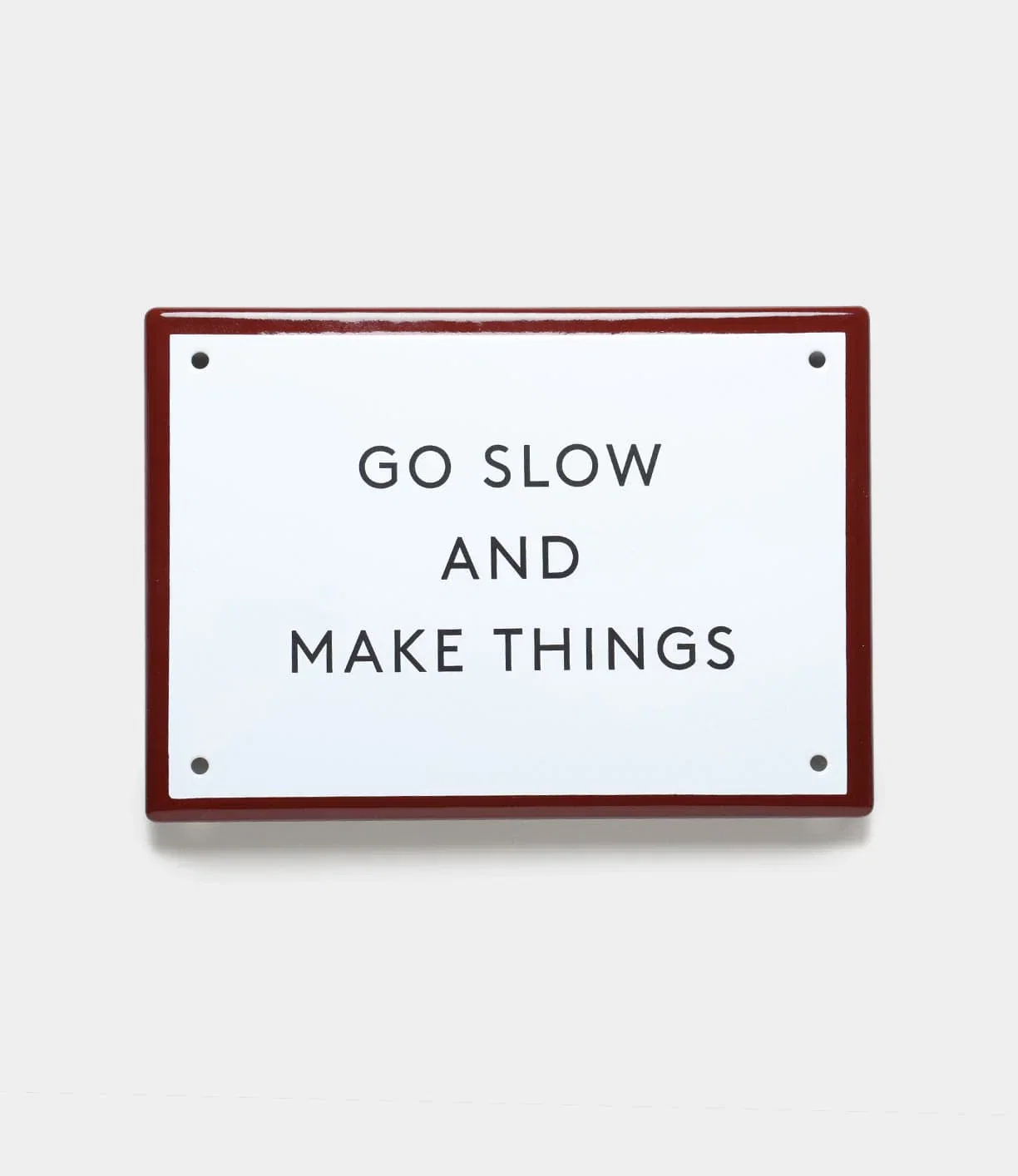 Image of “Go Slow” Enamel Steel Sign