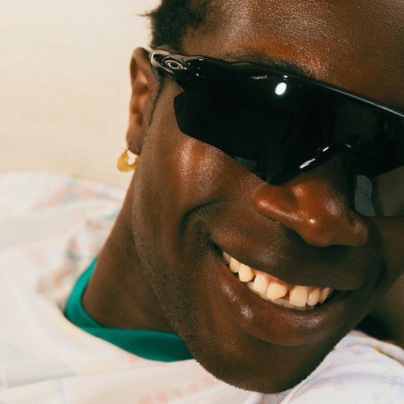man in sunglasses smiling 