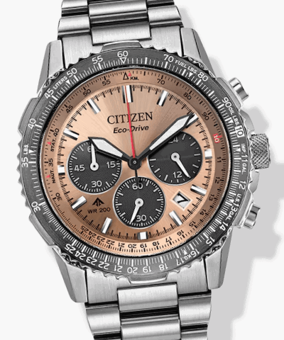 Citizen Eco-Drive chronograph watch with beige dial, black subdials, and stainless steel bracelet.