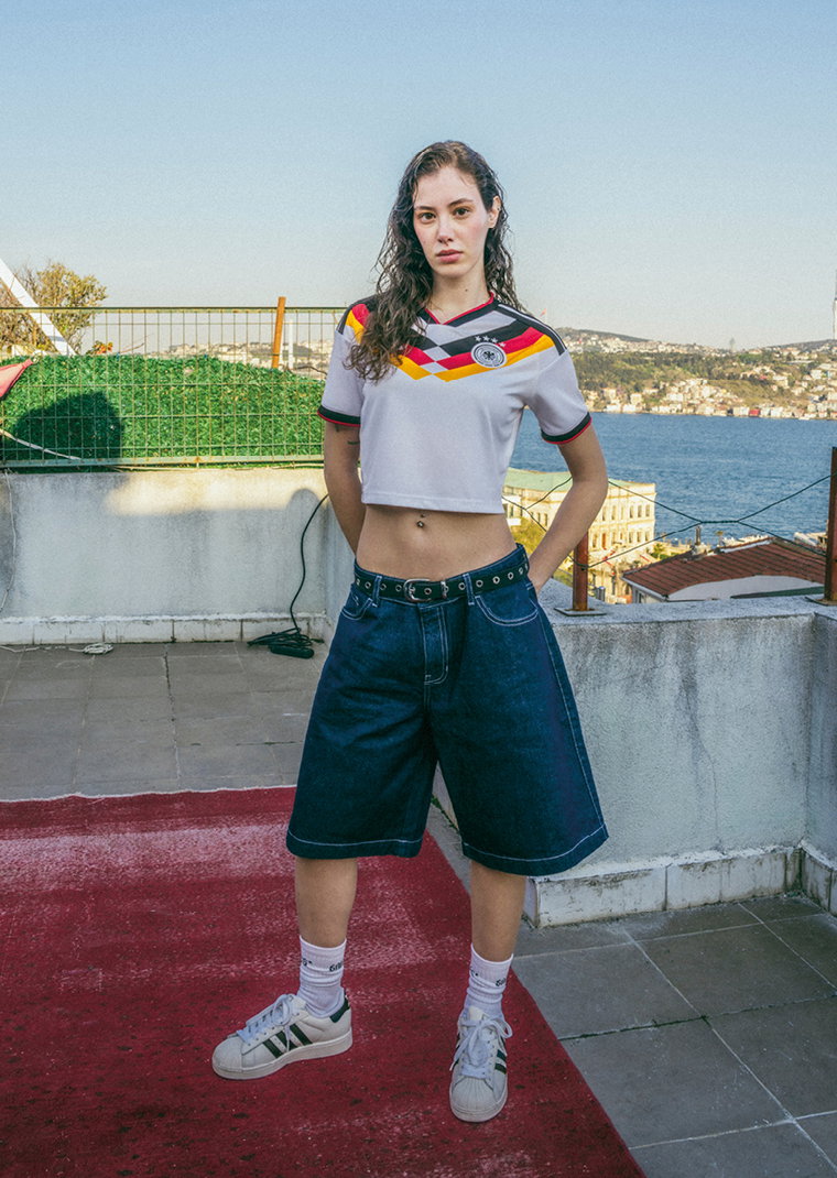 Woman in Jersey and Jeans