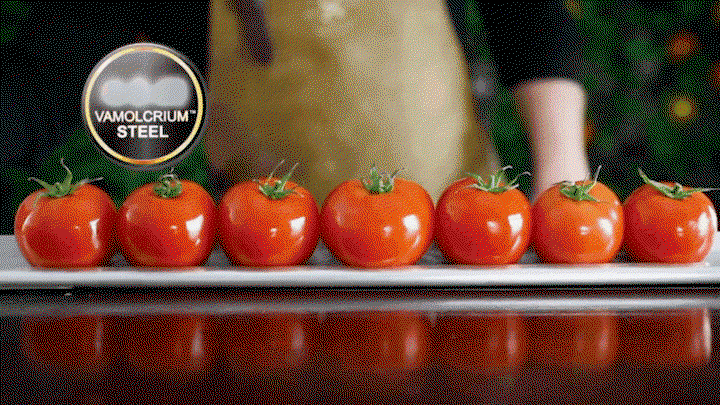 Gif of knife slicing tomatoes