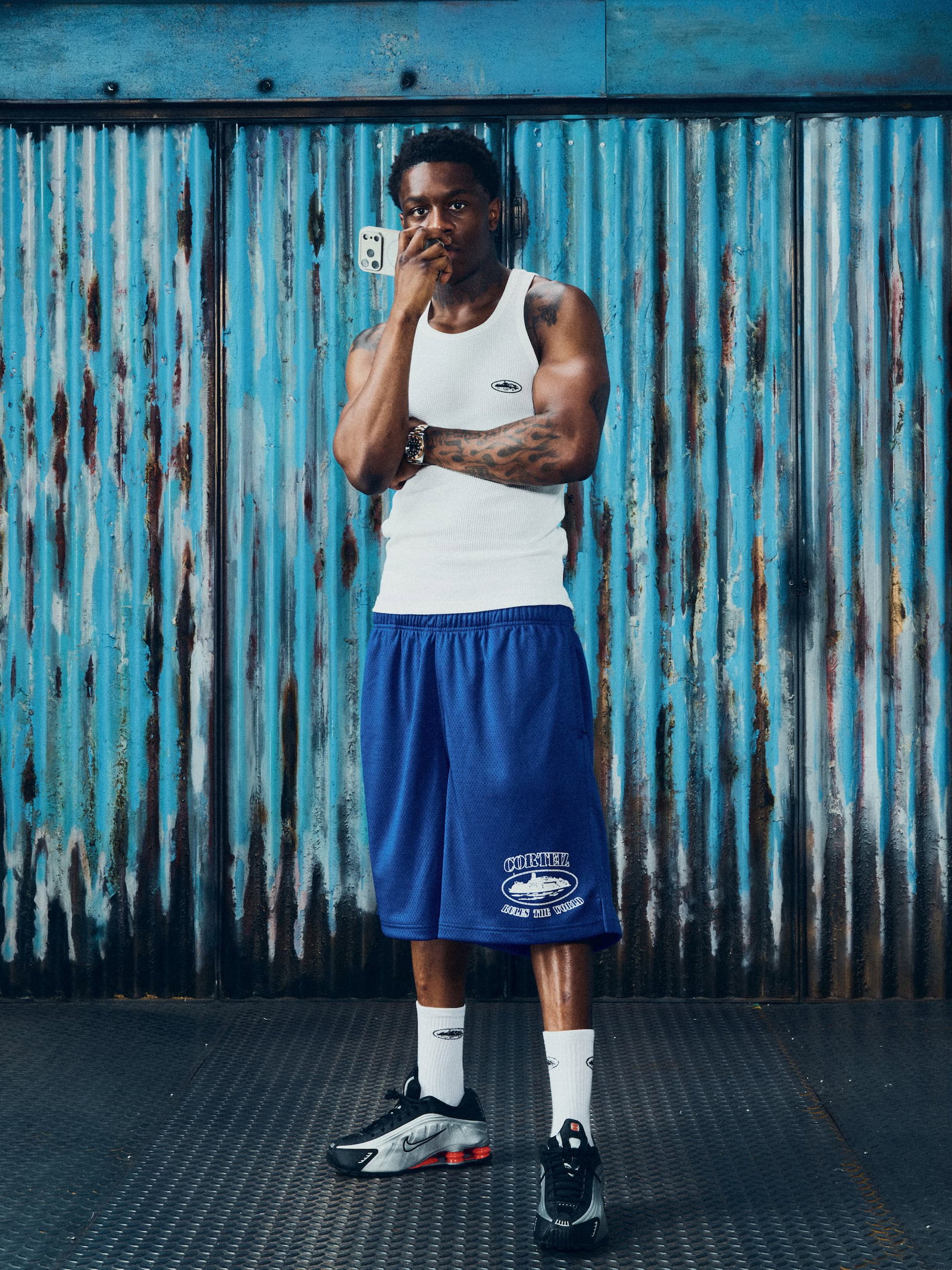 MWAY WEARS MESH SHORTS AND HMP TANK TOP
