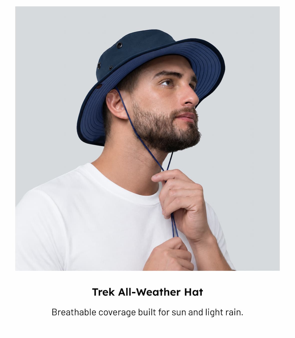 Man wearing Trek All-Weather Hat in Navy/Steel Blue