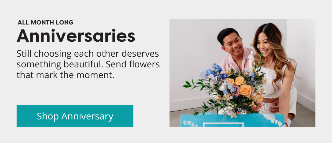 A couple holding a Callia bouquet