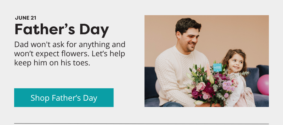 Father and young daughter with a Callia bouquet