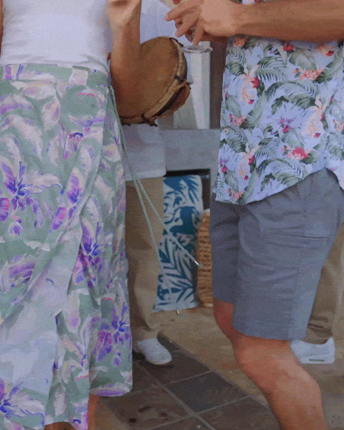 Animated tropical lifestyle scene featuring resort-ready summer outfits.