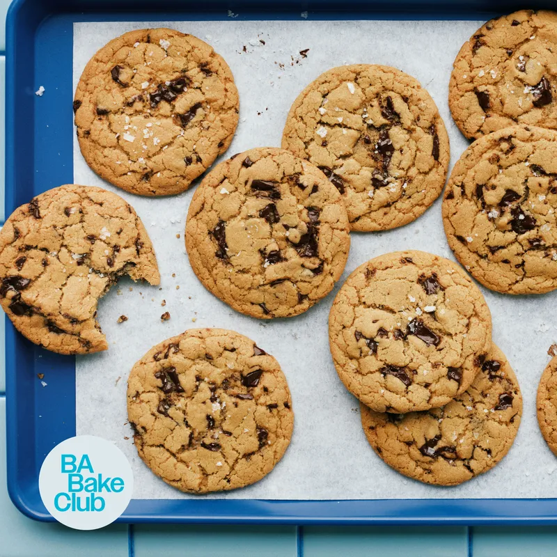 Chocolate chip cookies on a sheet tray.