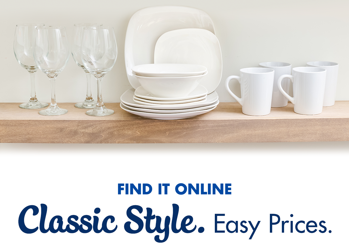 Classic Style. Easy Prices. Image of classic white plates, bowls, and coffee mugs on a shelf with long-stem wine glasses