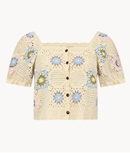 A cream crochet, short-sleeved top