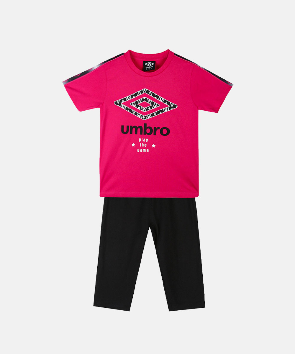 Kids' Umbro two-piece outfit: bright pink short-sleeve T-shirt with black geometric logo and "play the game" text, paired with black cropped leggings