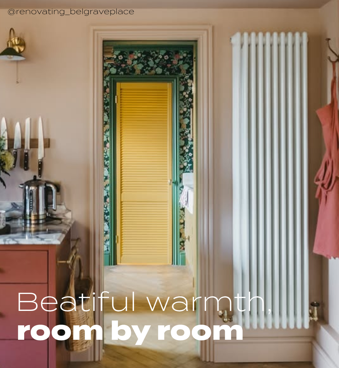 Kitchen with white vertical column radiator on wall