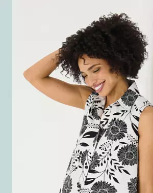 From 29.99 dresses from Lucky Brand, DKNY, Maison Tara and more. Shop now. A woman in a white dress with a black flowers print.