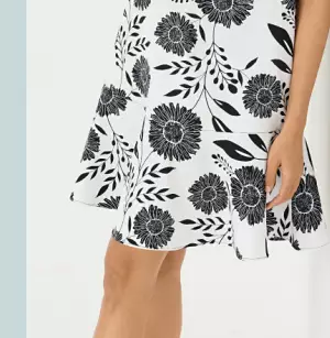 From 29.99 dresses from Lucky Brand, DKNY, Maison Tara and more. Shop now. A woman in a white dress with a black flowers print.