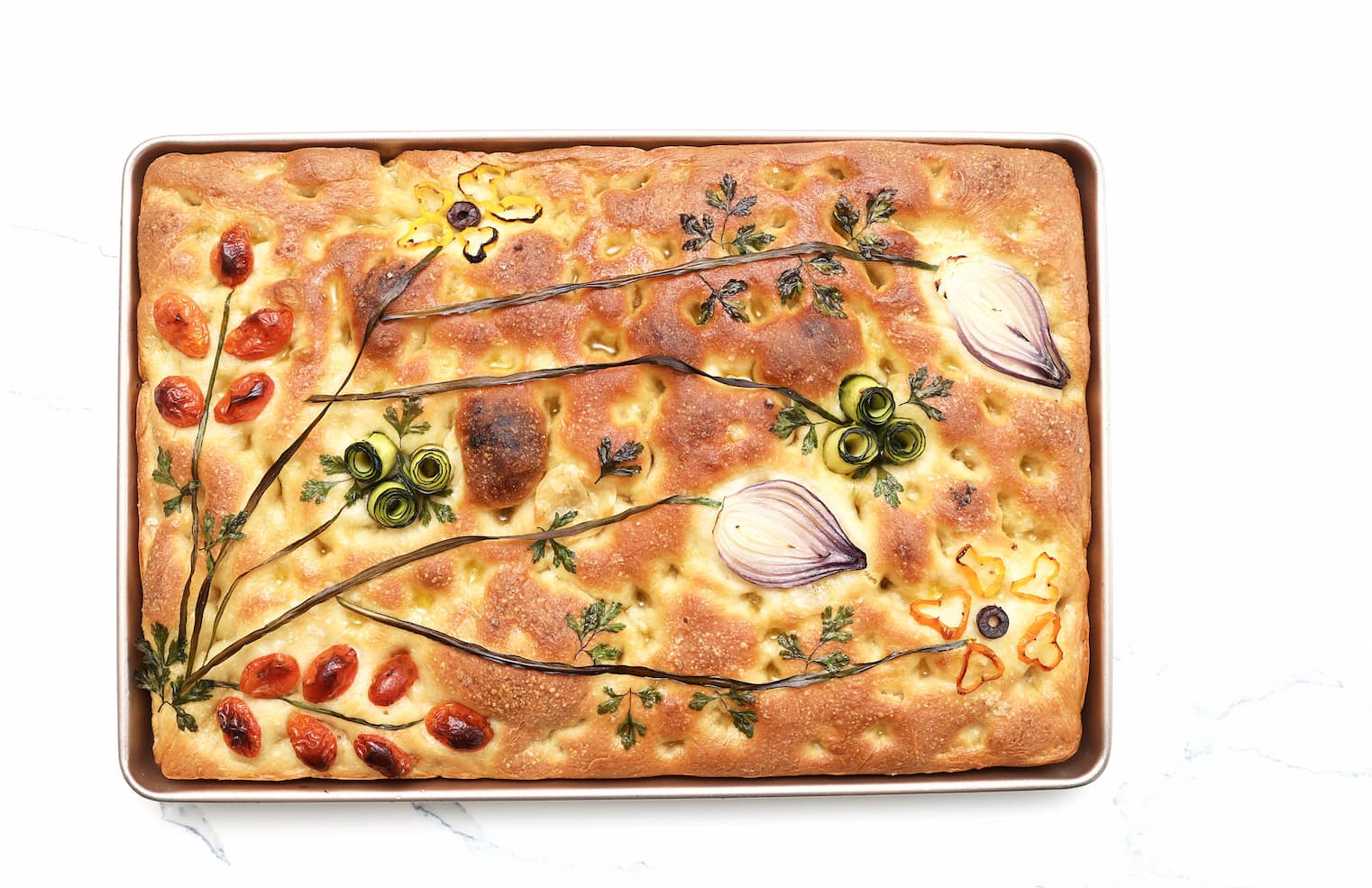 Garden Focaccia — finished beauty shot with tomato petals and herb stems