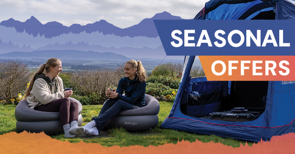 SEASONAL OFFERS. Two women sit on Vango Inflatable Donut Chairs outside a Berghaus Tent.