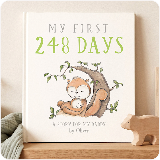 A personalised first Father's Day book titled "My First 248 Days, a story for Daddy by Oliver" with a illustrated woodland animal on the cover