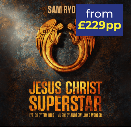 A dramatic poster for "Jesus Christ Superstar" featuring a golden emblem and promotional text.