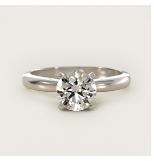 Petite solitaire engagement ring in platinum