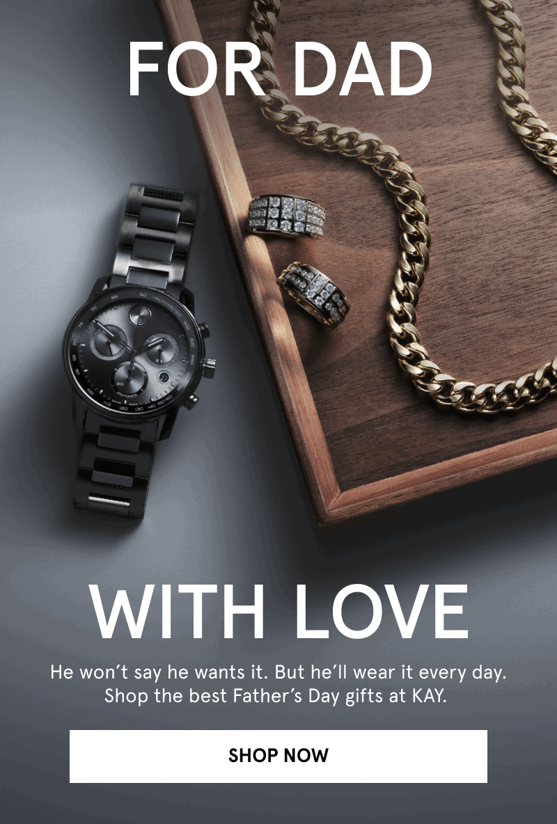 Black onyx watch, diamond hoops and yellow gold chain on wooden tray. For dad with love. Click shop now.