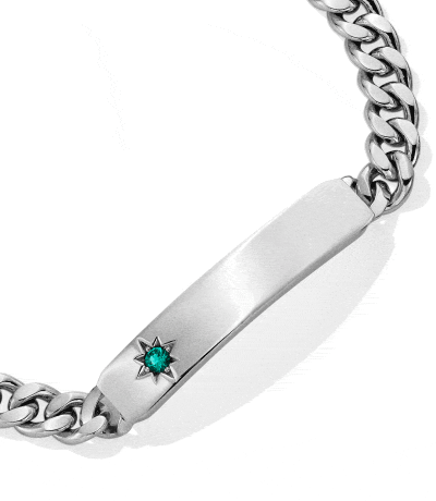 Animated GIF of silver curb chain ID bracelet engraved with Julian and green birthstone star accent.