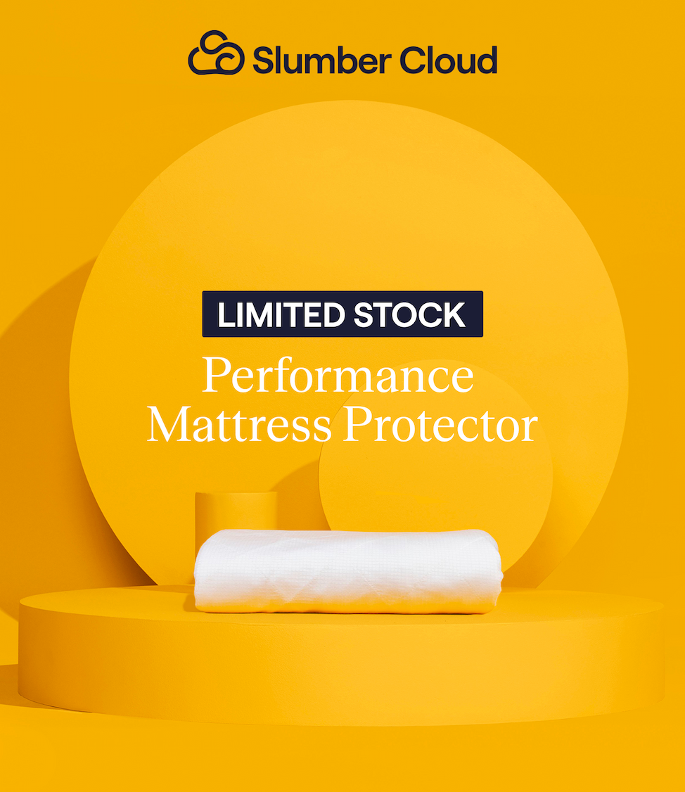 The Performance Mattress Protector sitting on a yellow pedestal