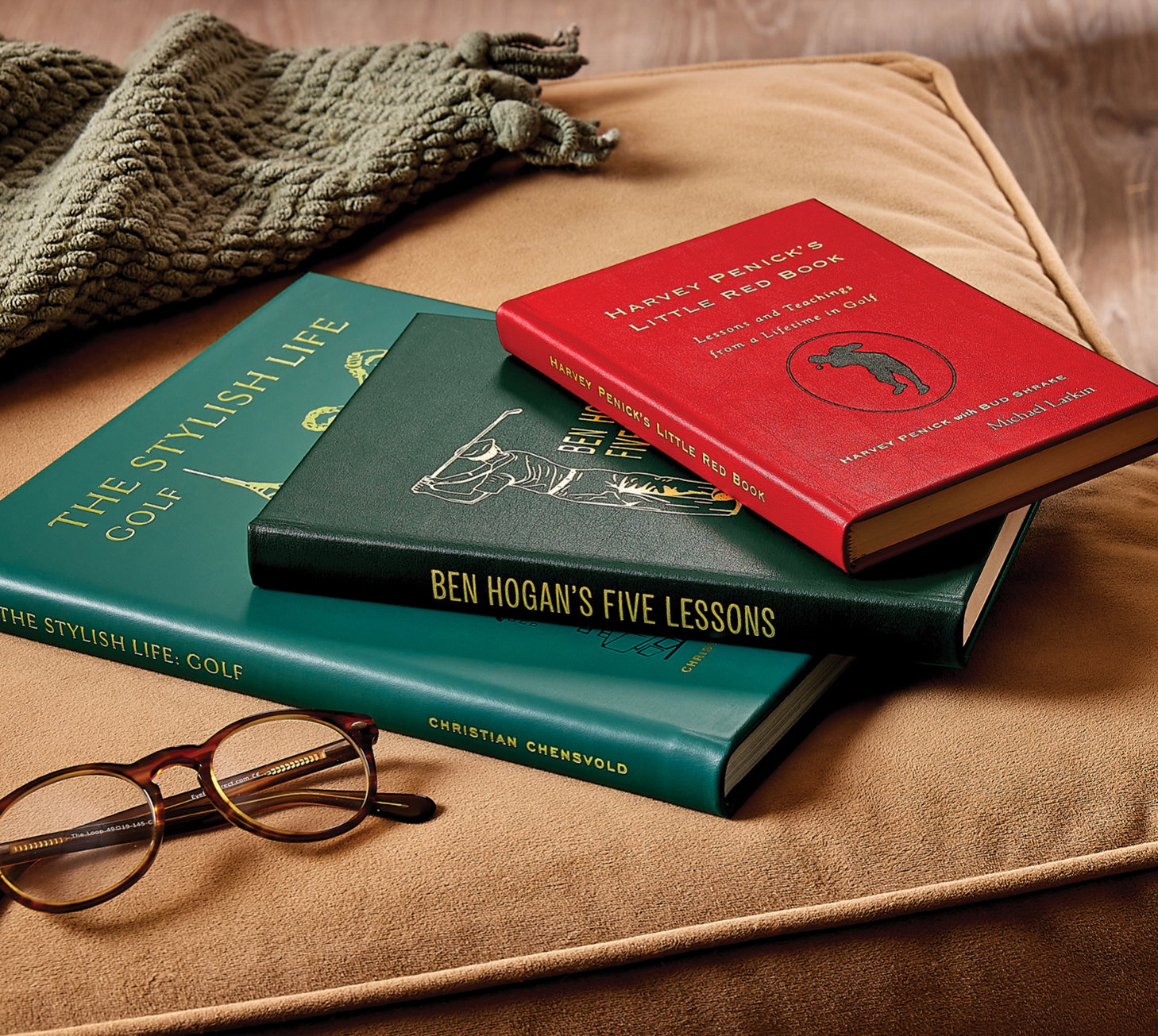 Leather-bound editions of various golfing books.
