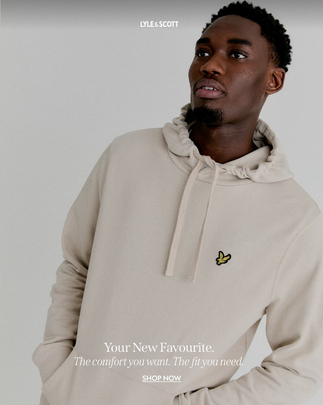 Man wears Loopback Cotton Hoodie in Cove