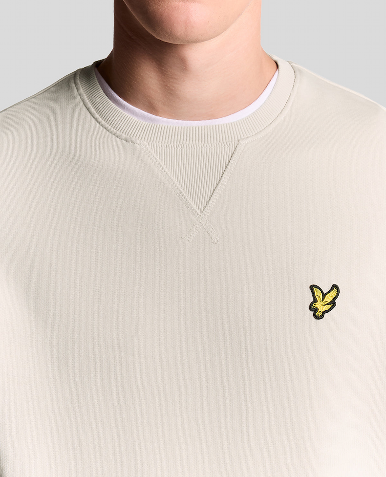 Man wears Cotton Crew Neck Sweatshirt in Cove