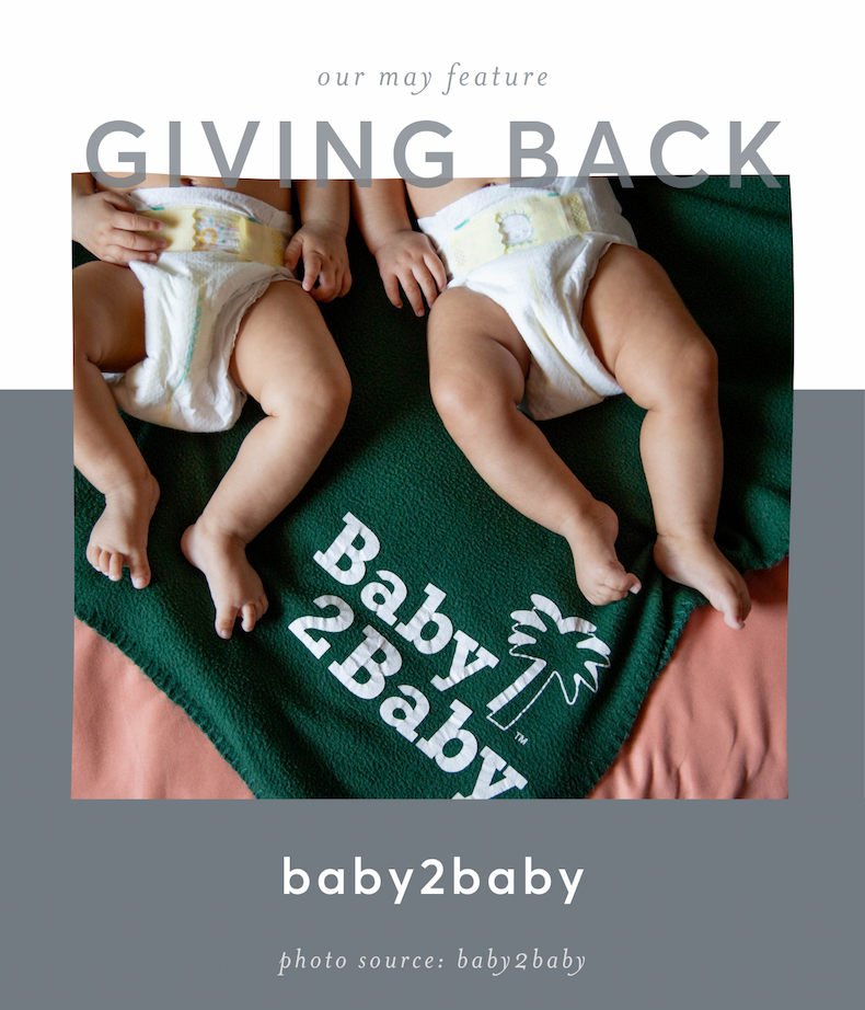 Two infants in diapers laying on Baby2Baby blanket
