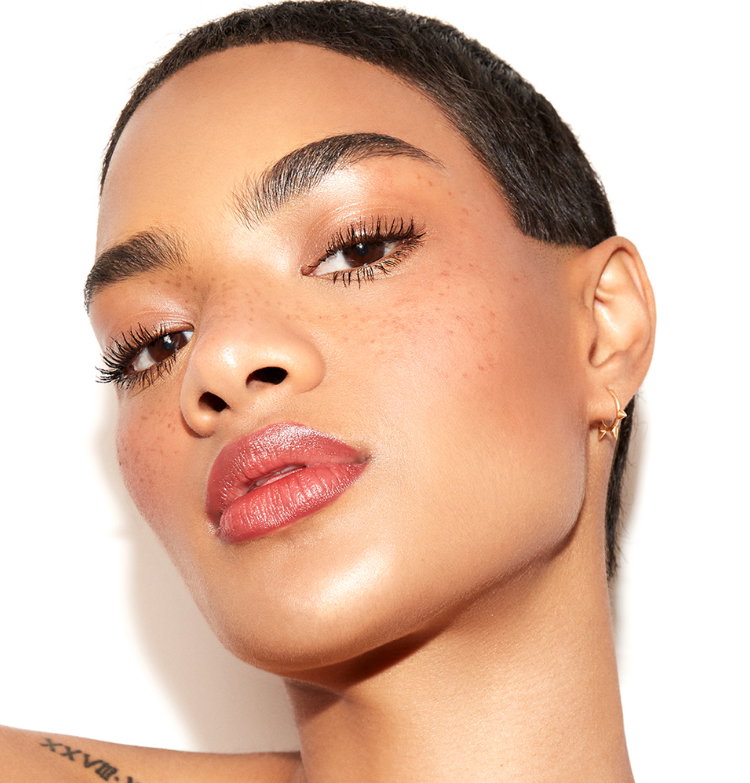 Model rocking freckles from Freck