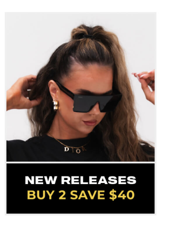 Woman with hair in bun wearing sleek dark sunglasses, labeled recent releases section