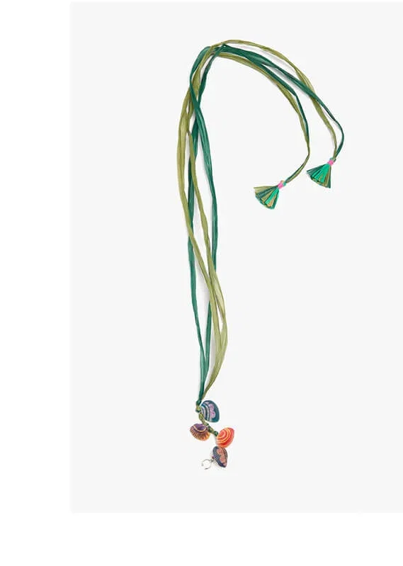 Decorative shells and fringes with footwear
