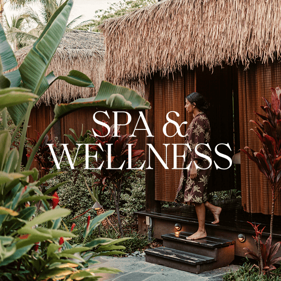 Woman stepping out of a spa hut in a robe. Text overlay: Spa & Wellness.