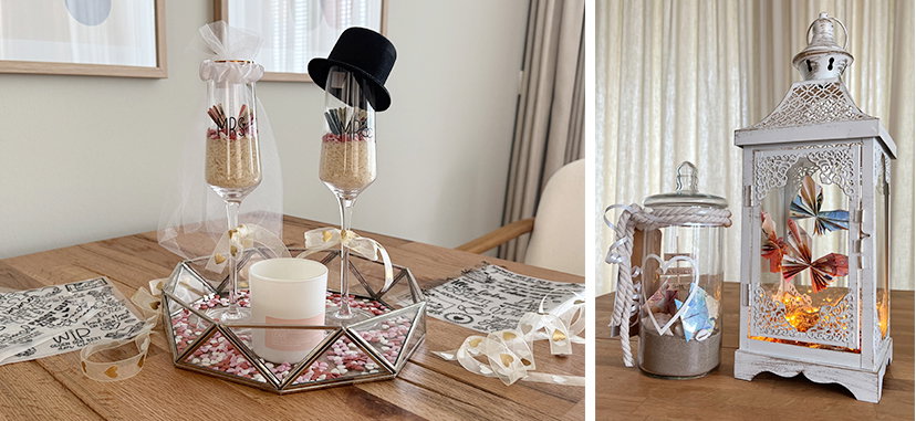 Zweiteilige Collage zum Thema Hochzeitsgeschenkideen: Auf dem linken Bild sieht man ein Glastablett mit zwei Sektgläsern auf einem Holztisch. Das linke Glas stellt Mrs dar und das rechte Mr. Auf dem rechten Bild sieht man eine Laterne mit Schmetterlingen und einer Lichterkette darin. Daneben steht ein Glas mit maritimem Inhalt. 
