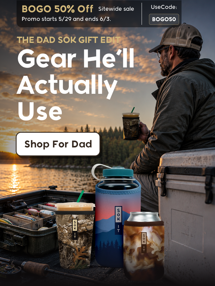 Man holding a tumbler near the waterfront