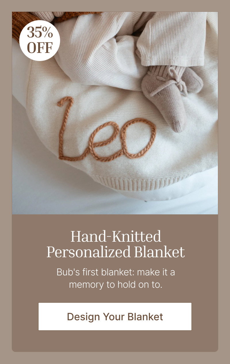 Personalized knit blanket with embroidered name shown on soft cream bedding with discount badge and customization button.