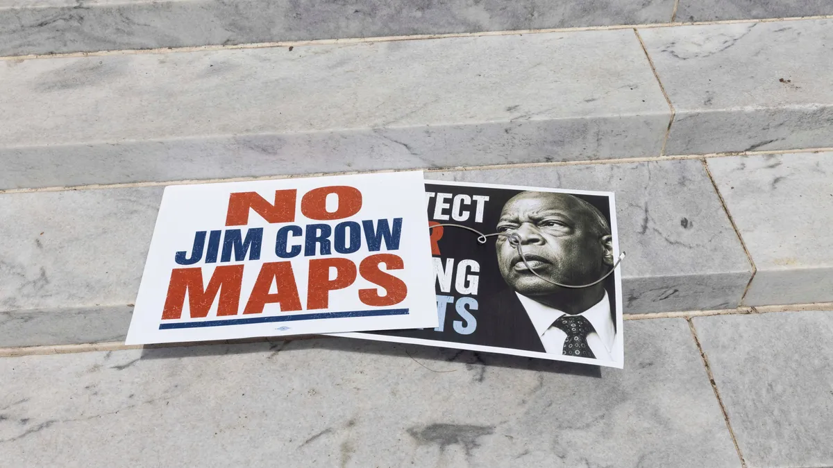Protest signs are displayed on the exterior steps of the Alabama state capitol building during the National Day of Action: All Roads Lead to the South rally against redistricting efforts, in Montgomery, Alabama, U.S. May 16, 2026.