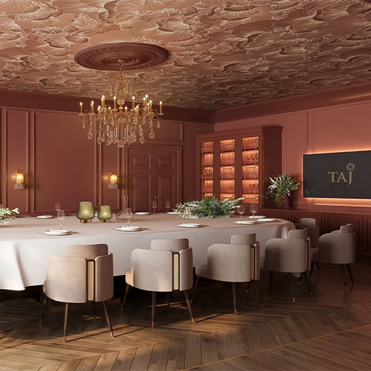 a large table with chairs and a chandelier
