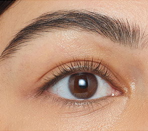 woman with bare lashes